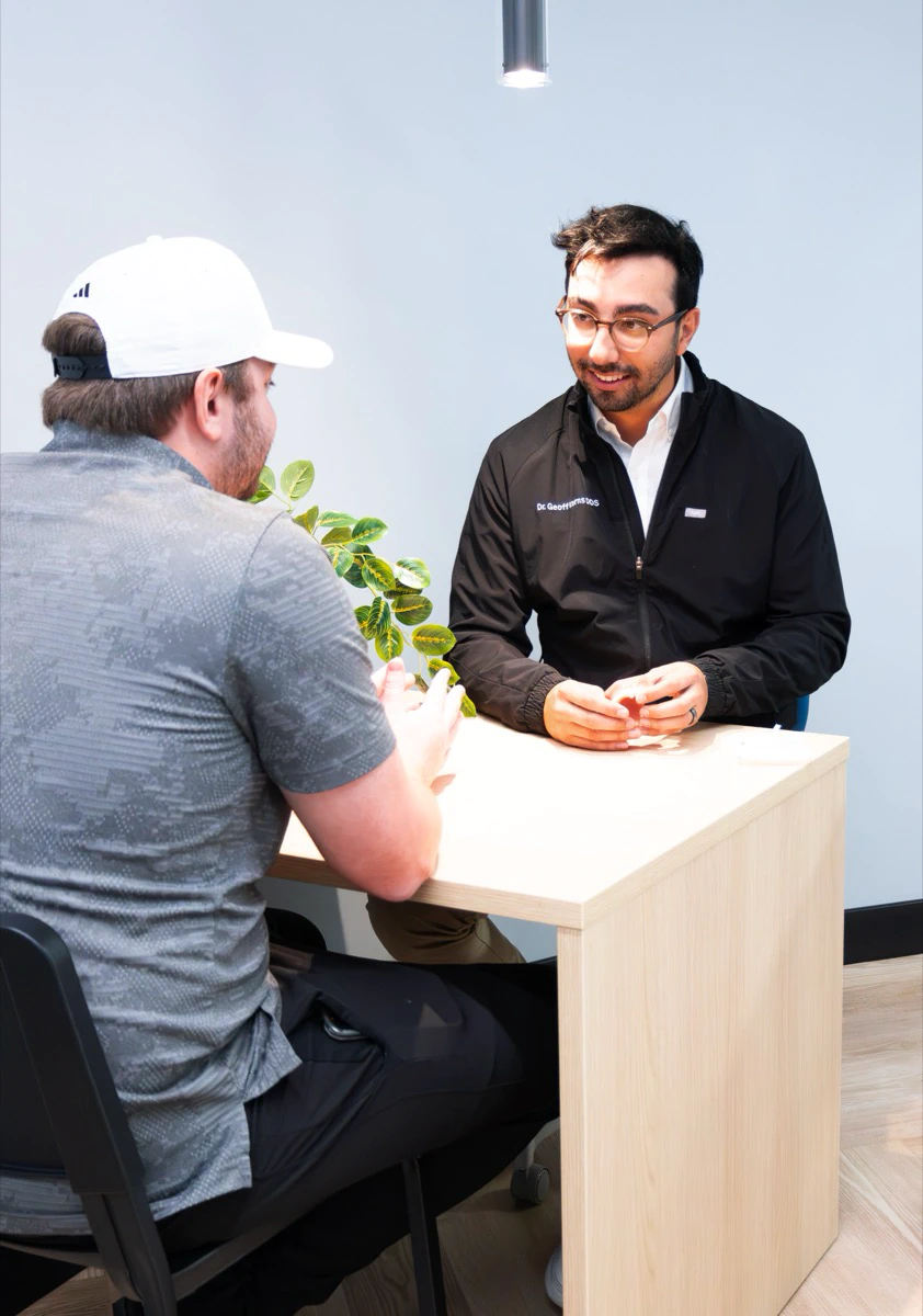 Dentist discussing treatment options